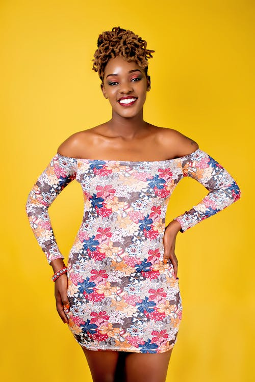 A Woman in an Off Shoulder Floral Dress
