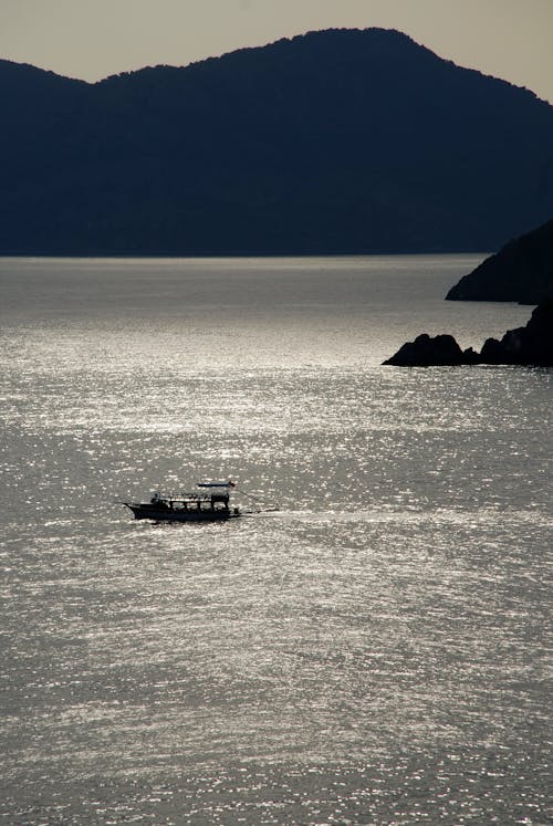 Silhouette of Boat on the Sea