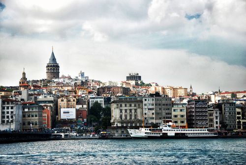 Free Scenic cityscape of Istanbul featuring the historic Galata Tower and bustling harbor. Stock Photo