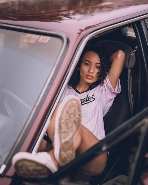 Woman Posing in Car