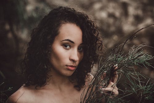 Woman Holding Green Plant