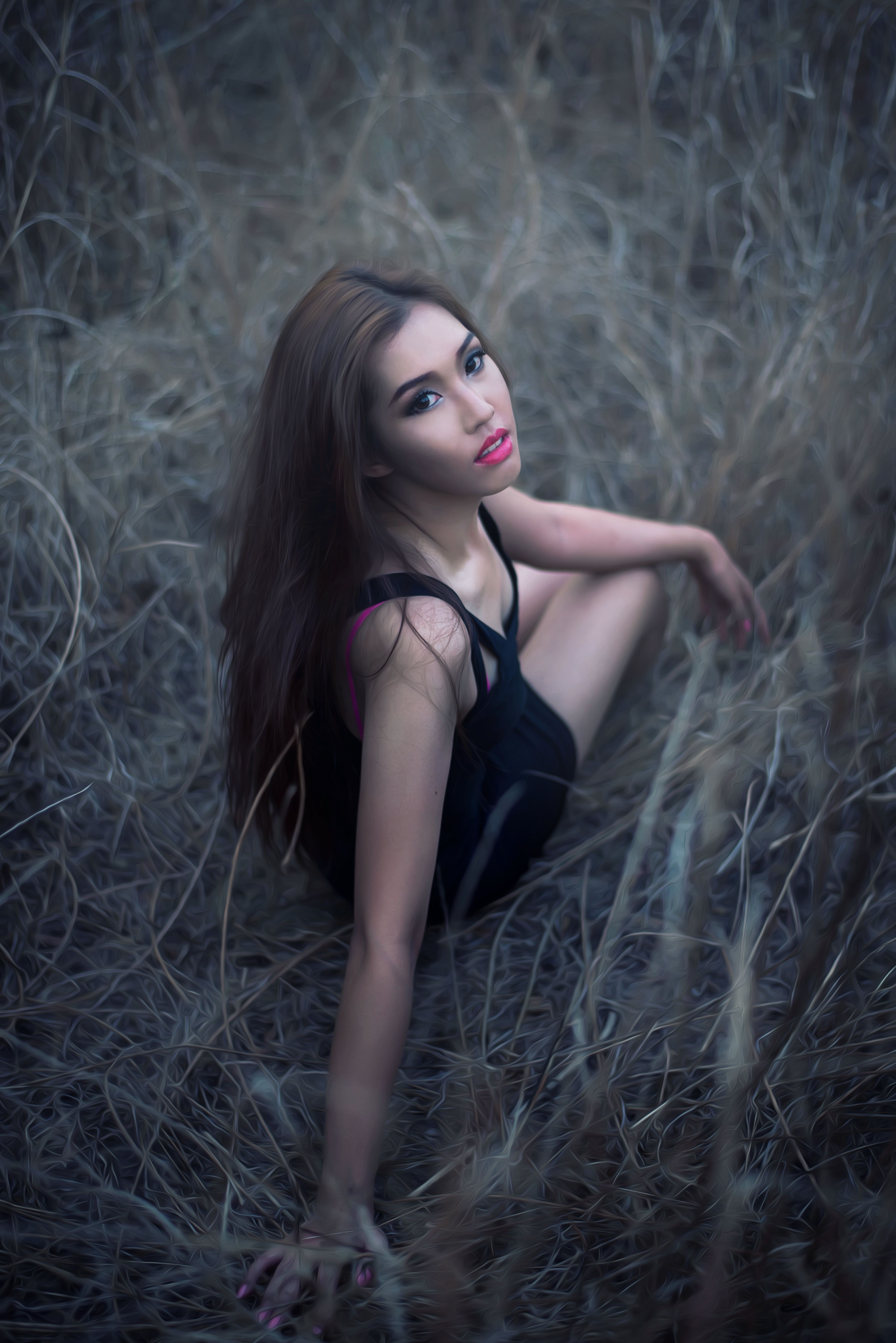 Woman in Black Dress Lying on Grass · Free Stock Photo