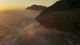 Aerial coastal mountains at dusk — Taryn Elliott on Pexels