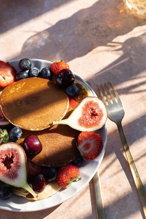 Free  Fruits and Pancakes on Ceramic Plate Stock Photo