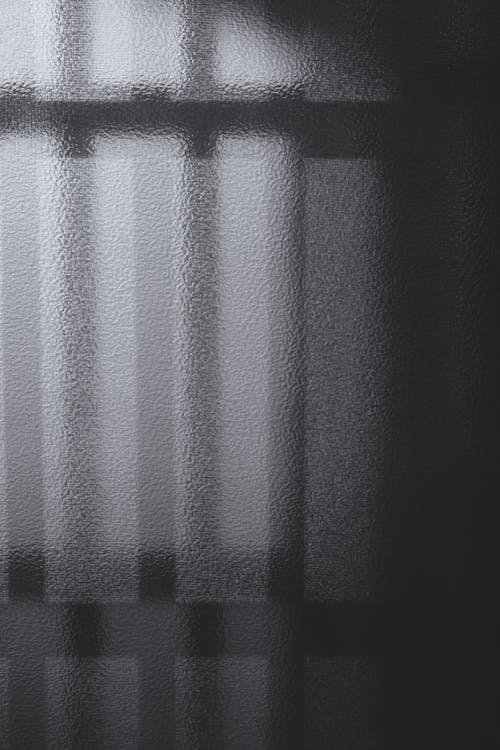 Shadow on a Curtain in Close-up Photography