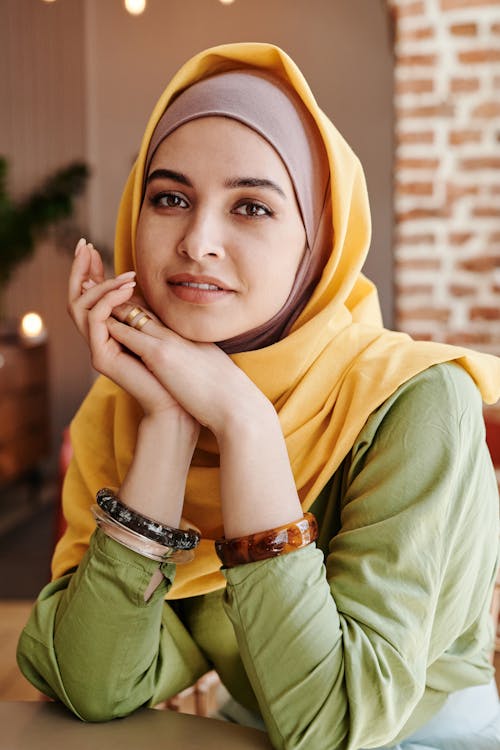 Woman in Yellow Hijab Smiling at the Camera