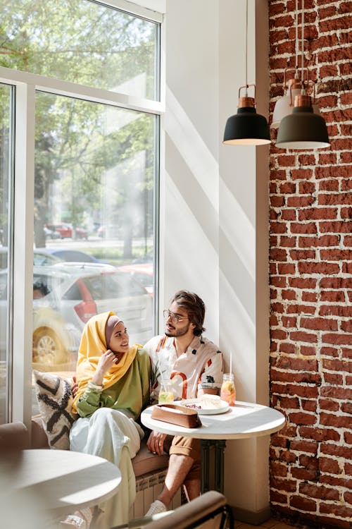 Free Couple Sitting Inside the Café Stock Photo