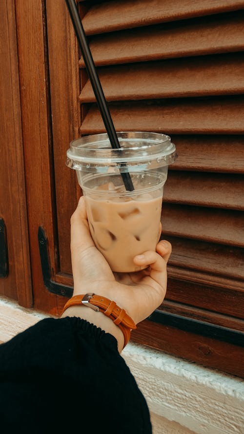 Free Woman with cup of iced coffee Stock Photo