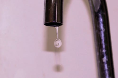 Free stock photo of tube, water drop Stock Photo