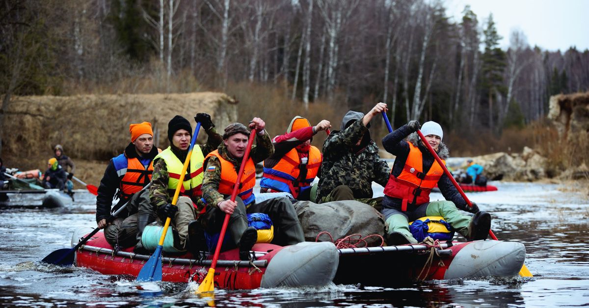 Photo Rowing A Log Raft People Rowing on an Raft · Free Stock Photo