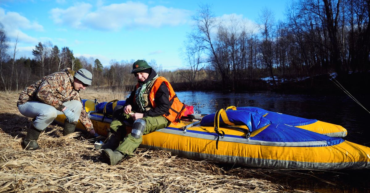 Guy On Inflatable Raft Two Men with an Inflatable Raft · Free Stock Photo