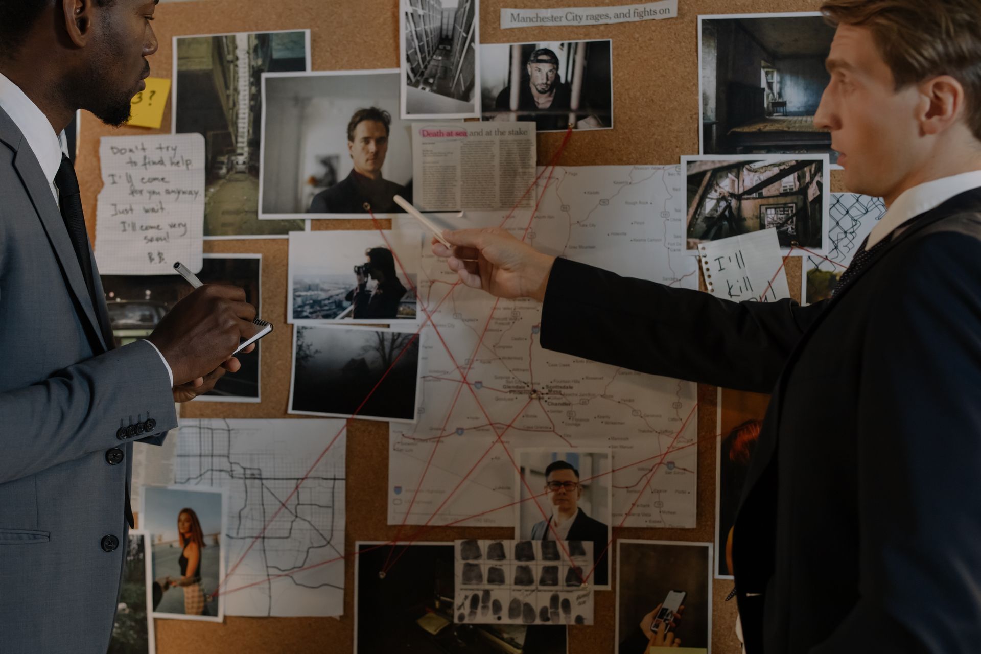 Men Having Conversation while Investigating