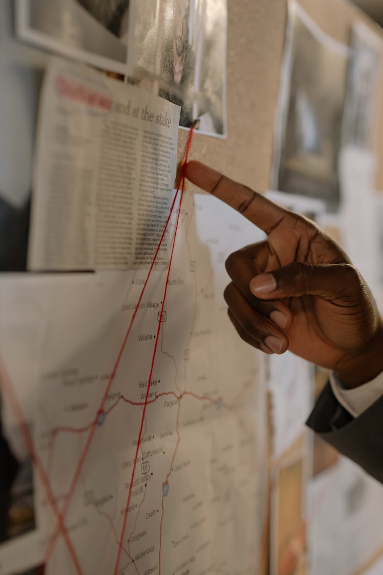 Red String On Corkboard