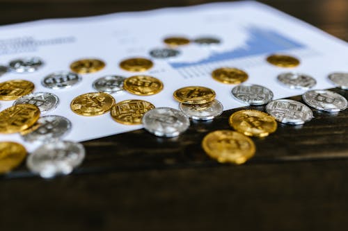 Free Close-up Photo of Silver and Gold Coins  Stock Photo