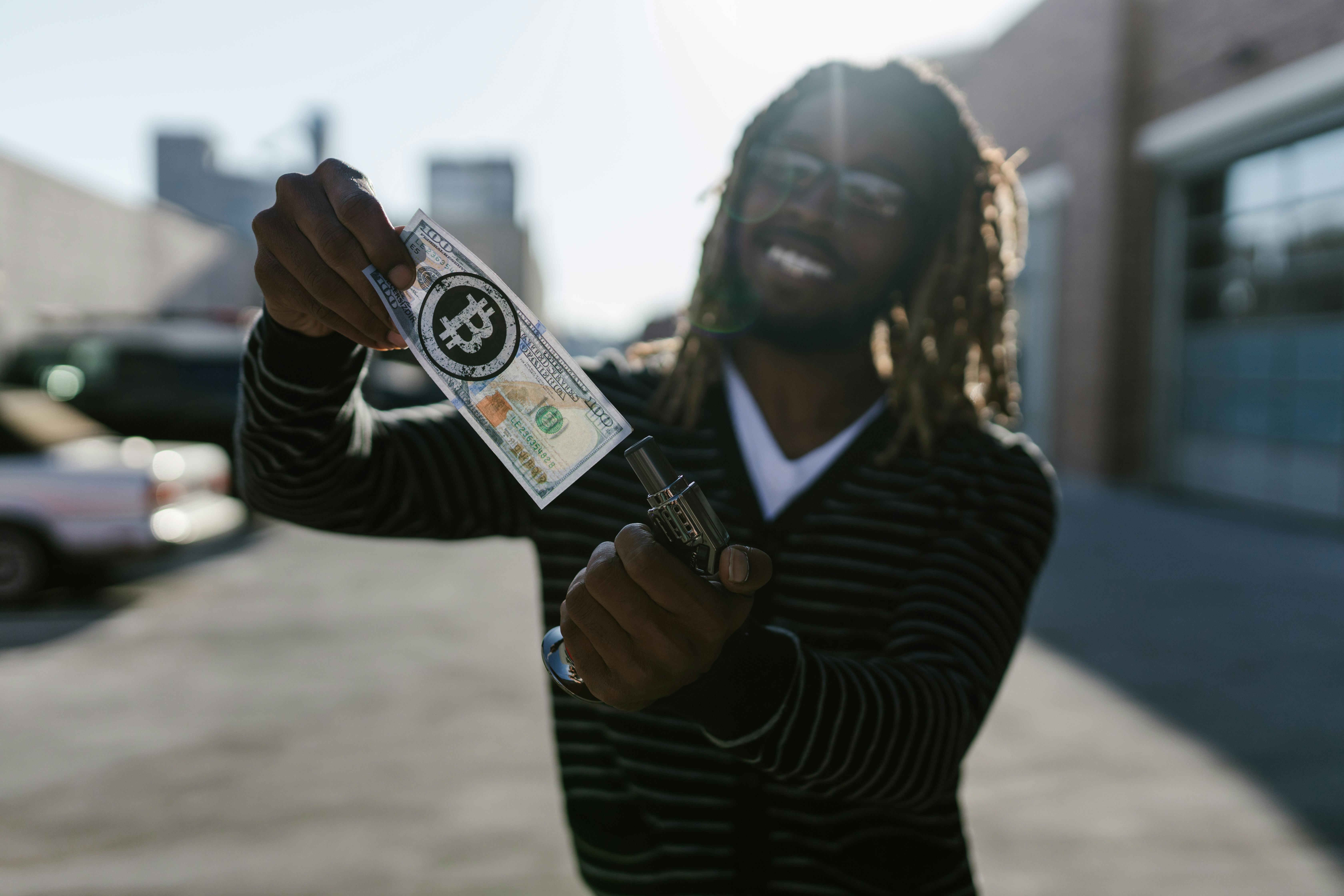 man holding a banknote