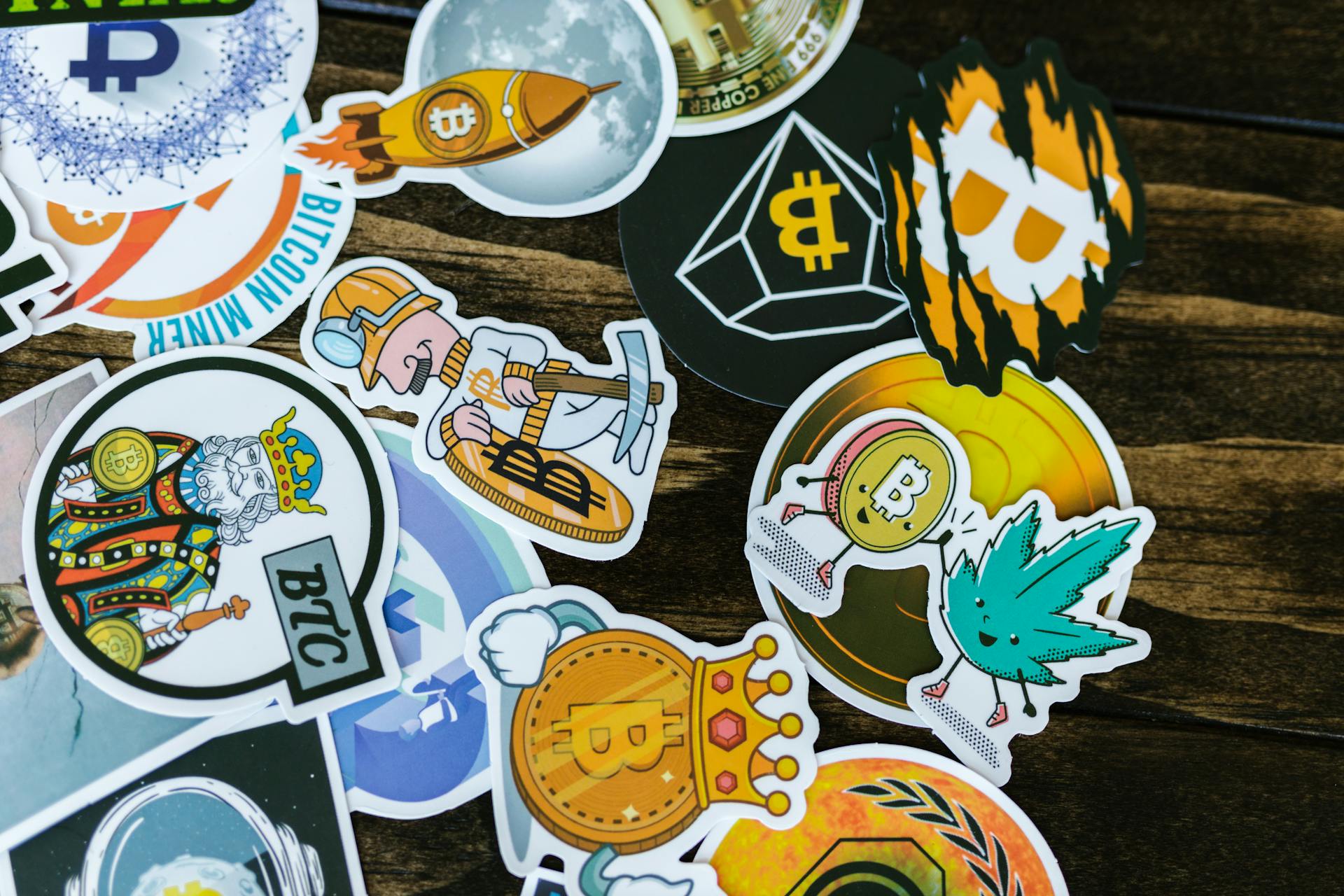 A Set of Stickers on a Wooden Surface