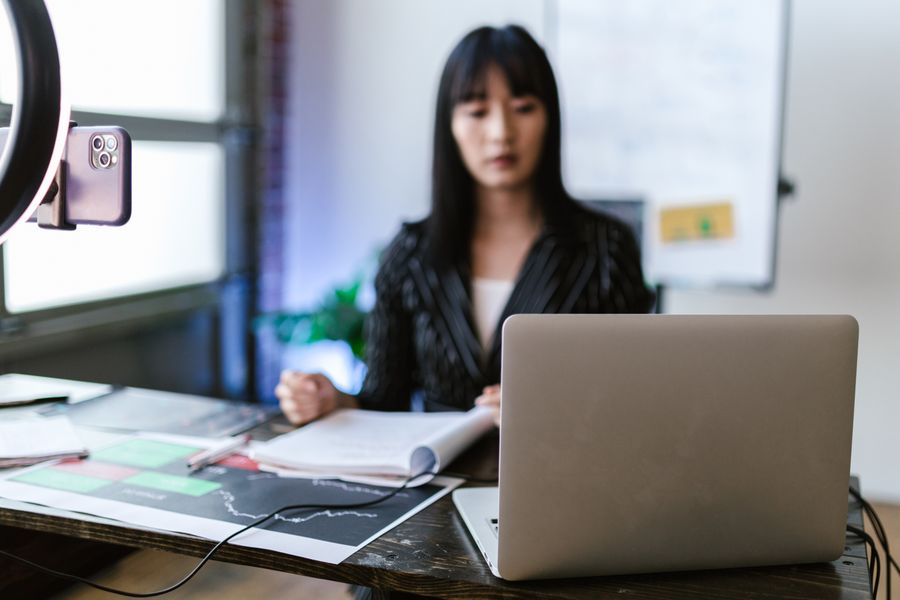 Person reviewing investments on a laptop