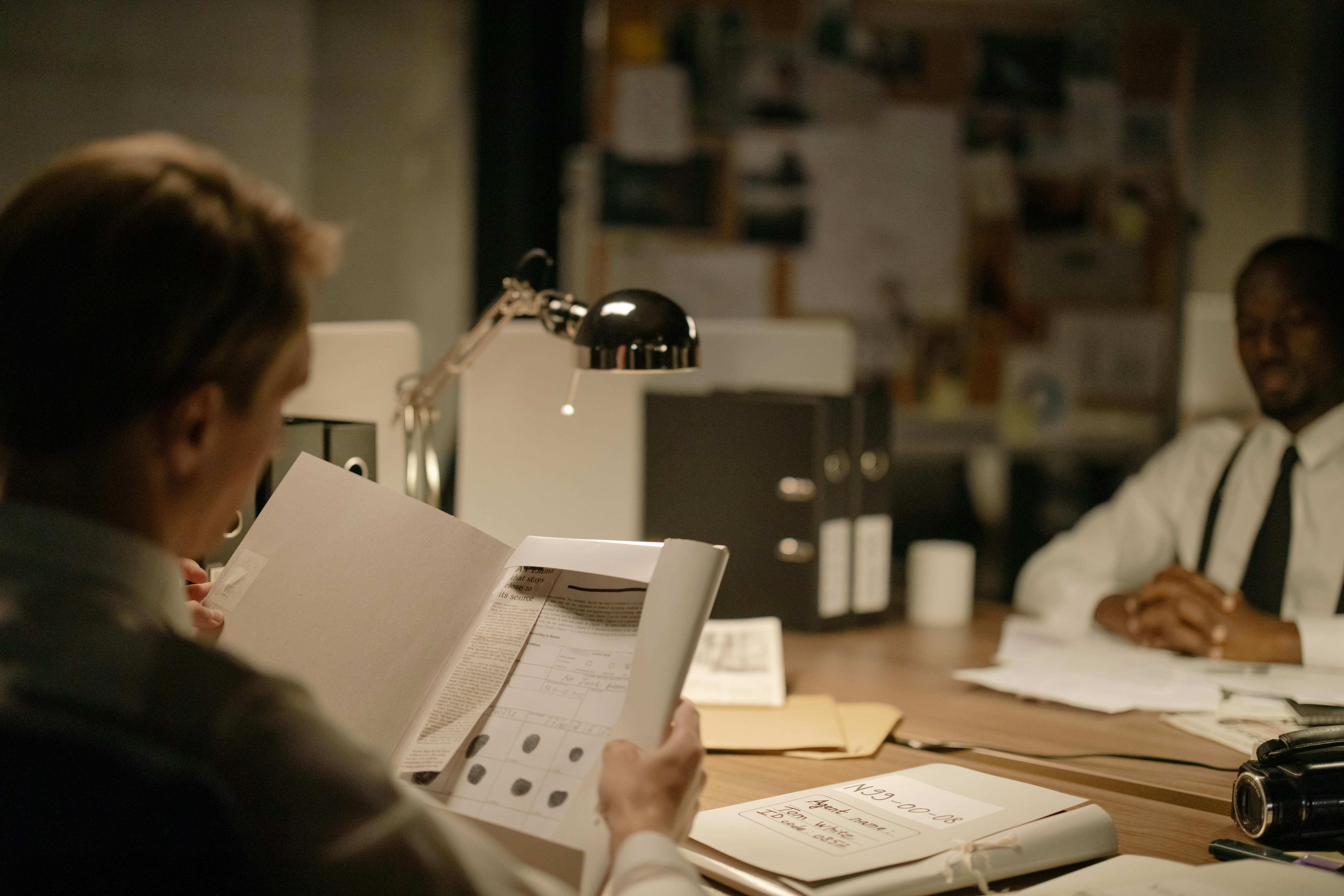 Legal team reviewing files and evidence for a wrongful death case - Fort Lauderdale wrongful death lawyer