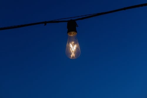 Close-up of a Light Bulb Under Blue Sky 