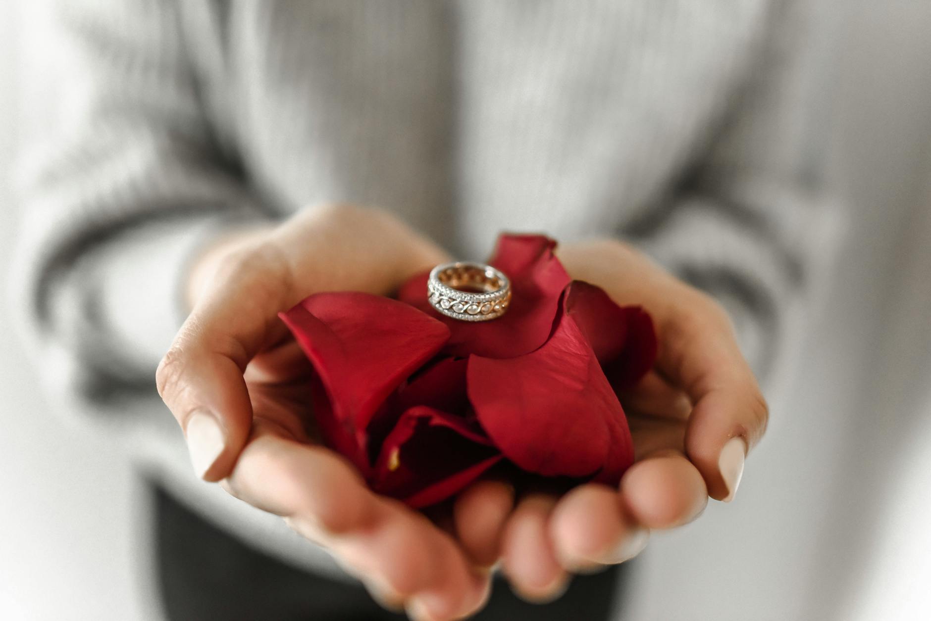 rose petals with ring 
