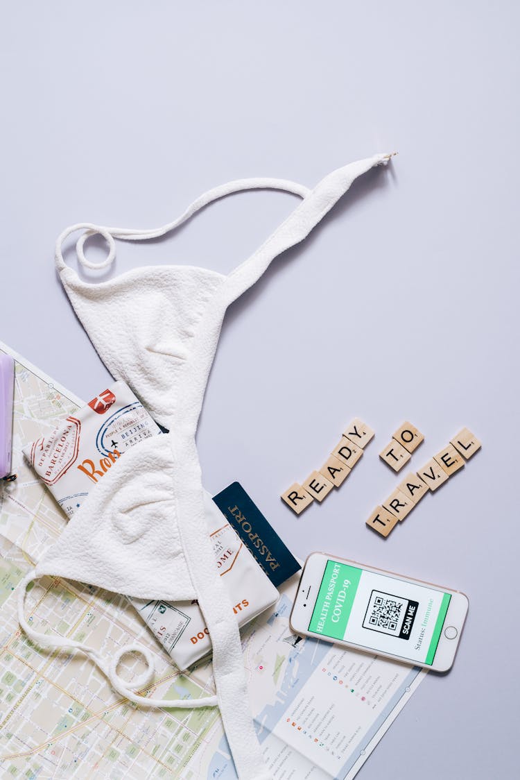 White Bra On Passport And Map