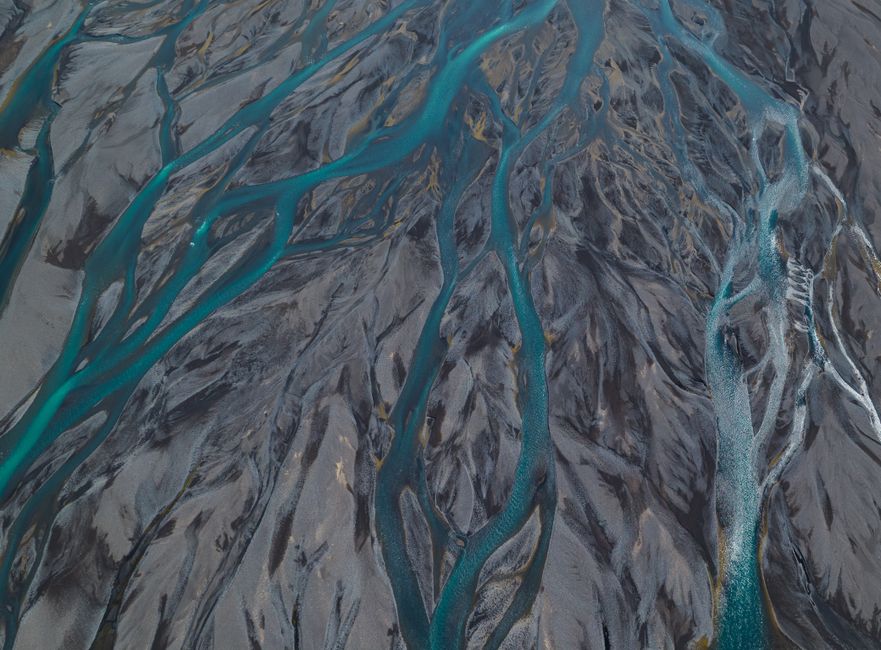 Stunning aerial capture of Iceland's braided rivers showcasing intricate patterns and natural beauty.