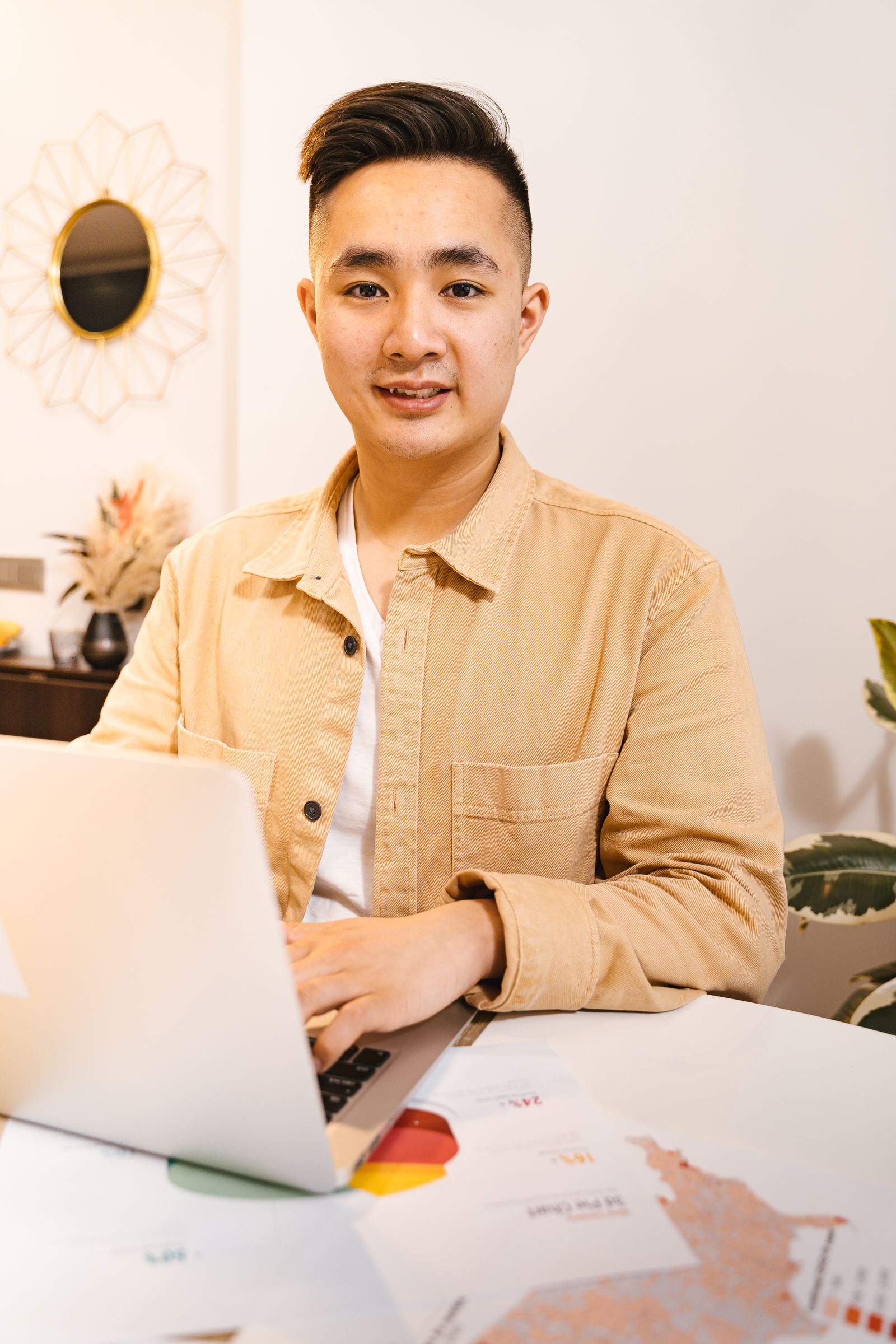 Entrepreneur working on a laptop while planning a digital business