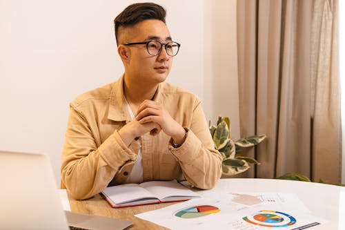 A Businessman with Documents on the Table