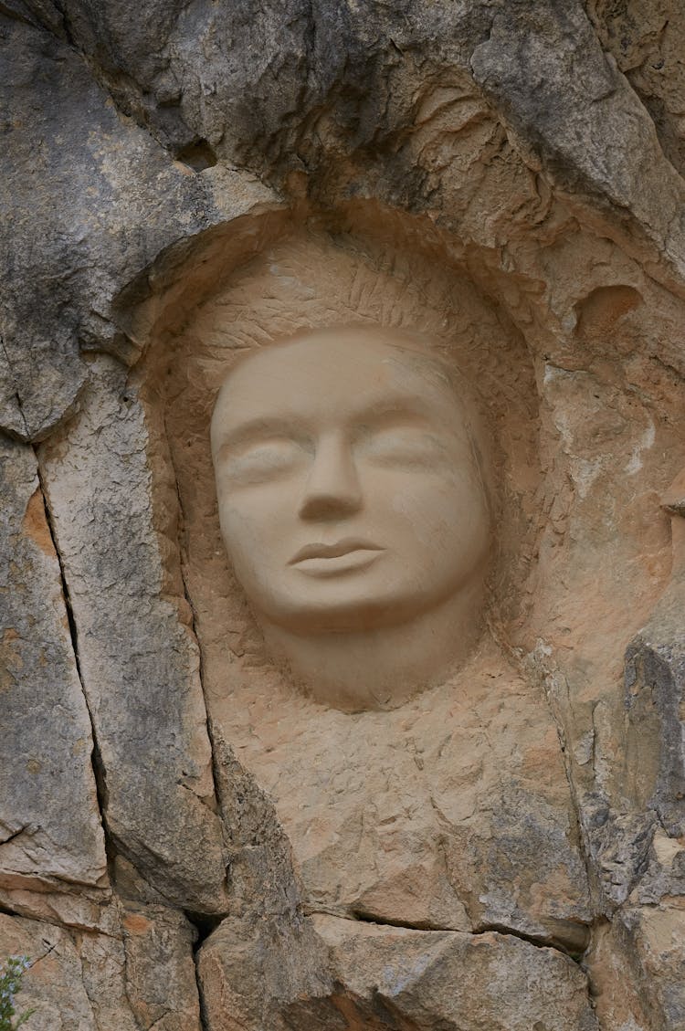 Image Of A Face On Stone 