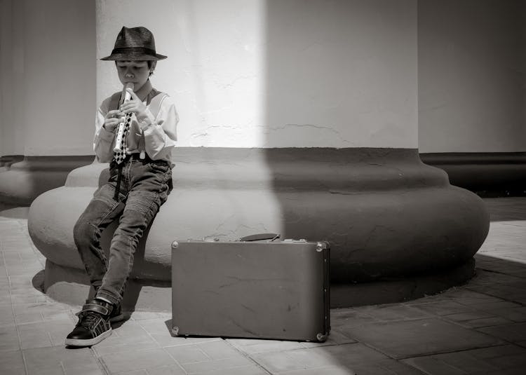 Boy Playing On Trumpet