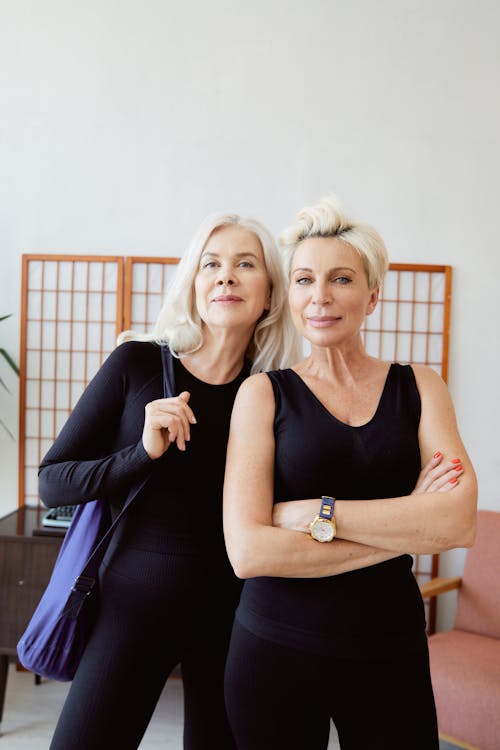 Free Close-Up Shot of Women Standing beside Each Other Stock Photo