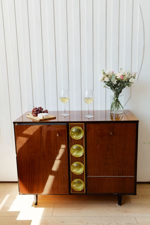 Fjellby walnut sideboard with brass pulls — photo by Darina Belonogova on Pexels