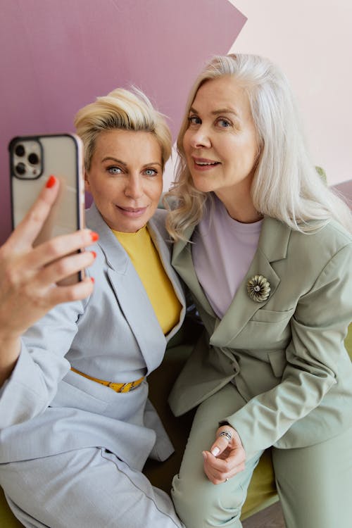 Women Taking Photo Using an Iphone