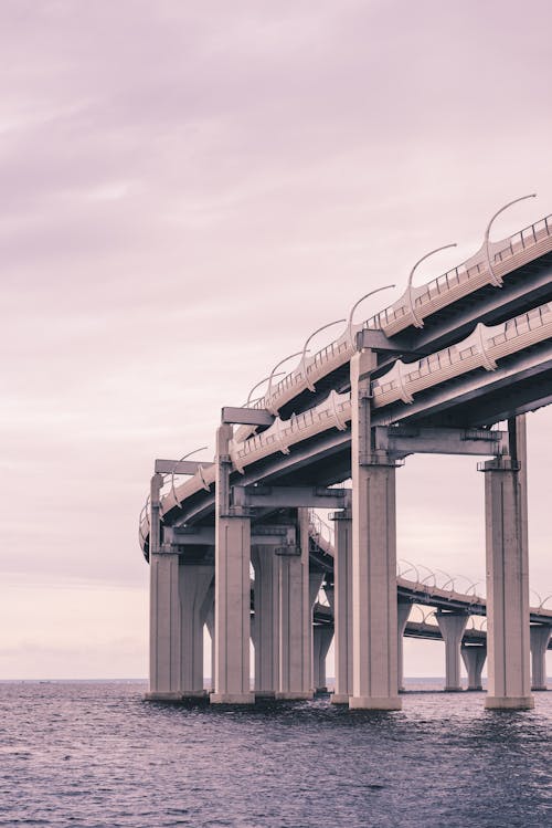 Gray Concrete Bridge Under White Sky