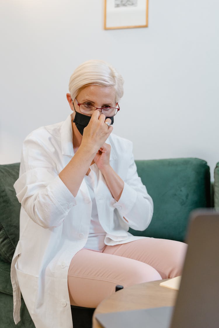 A Woman Wearing A Facemask