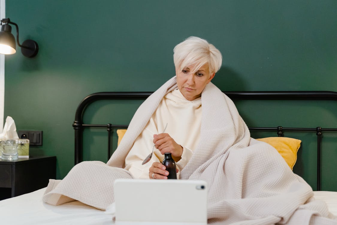 Free Woman in White Sweater with White Hair Stock Photo