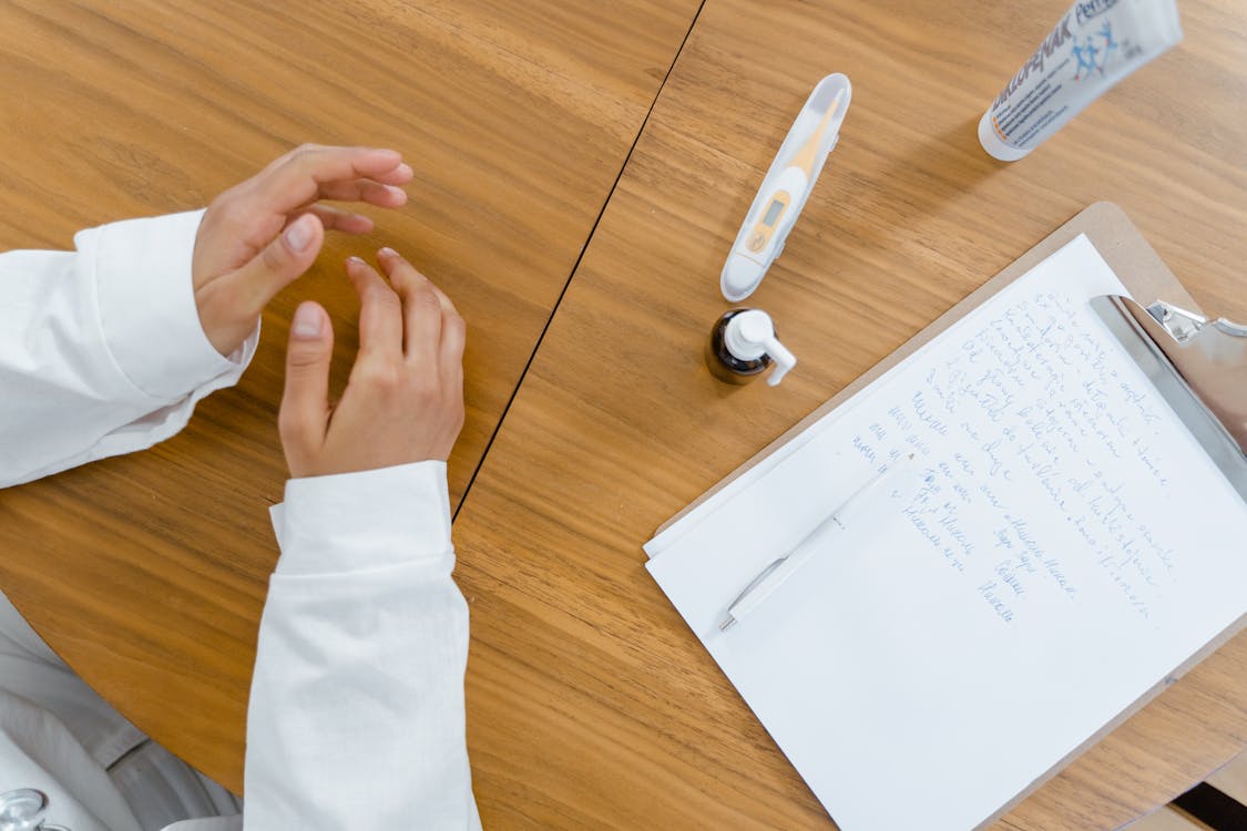 Written Notes on a Clipped Paper, demonstrating how technical writers help ancillary companies.