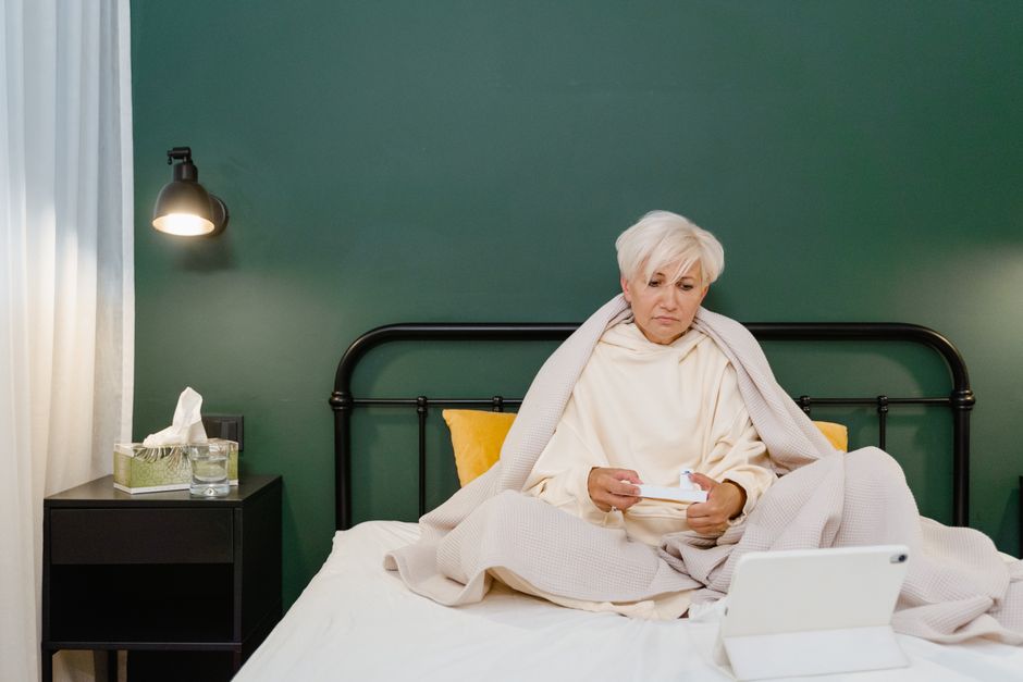 Woman preparing for a telehealth consultation from home