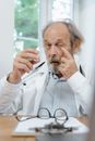 A Doctor Using Eyedrops
