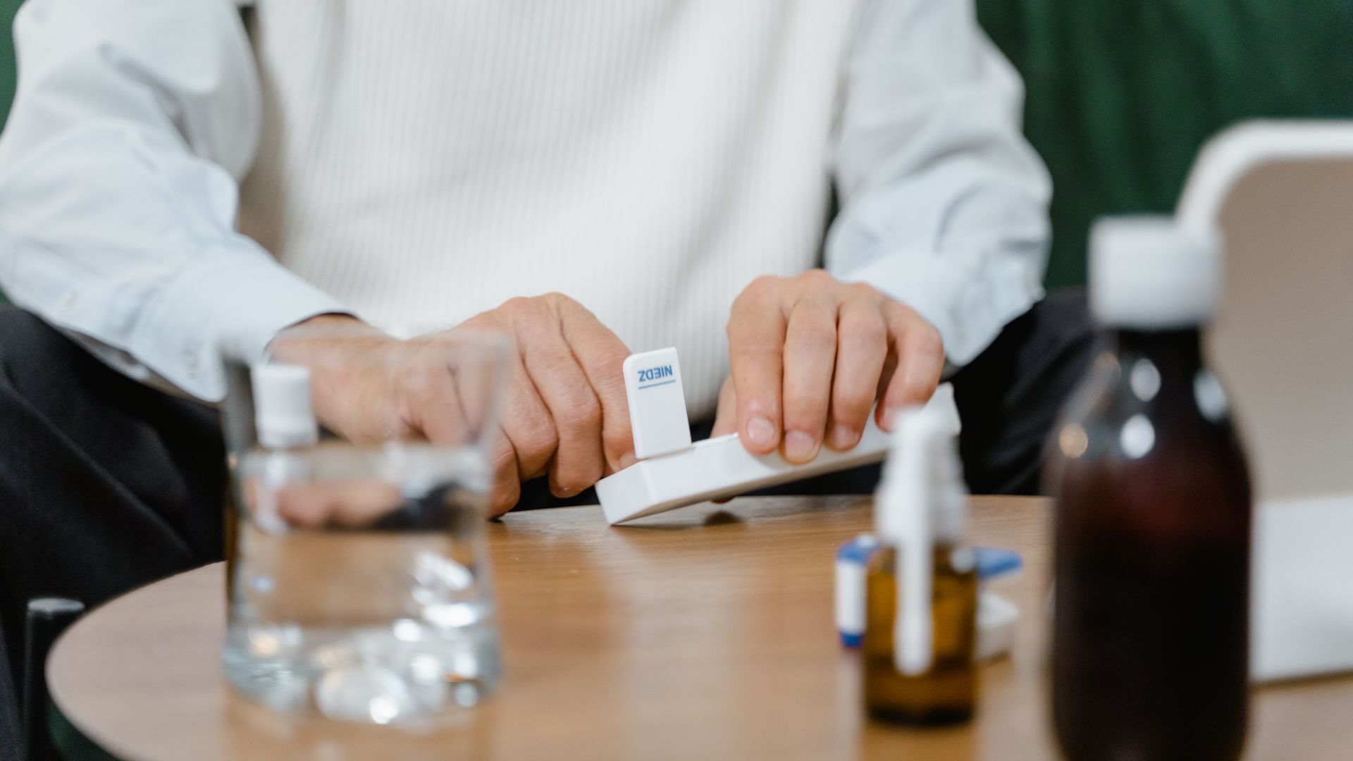 Modalert 200 Dosage: Finding the Right Balance A senior adult preparing medicine doses at home, emphasizing healthcare and telehealth solutions.