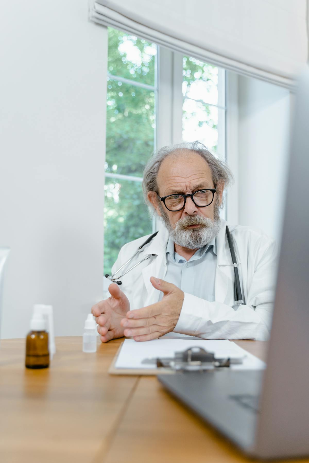 Doctor discussing health information with a patient in a clinic