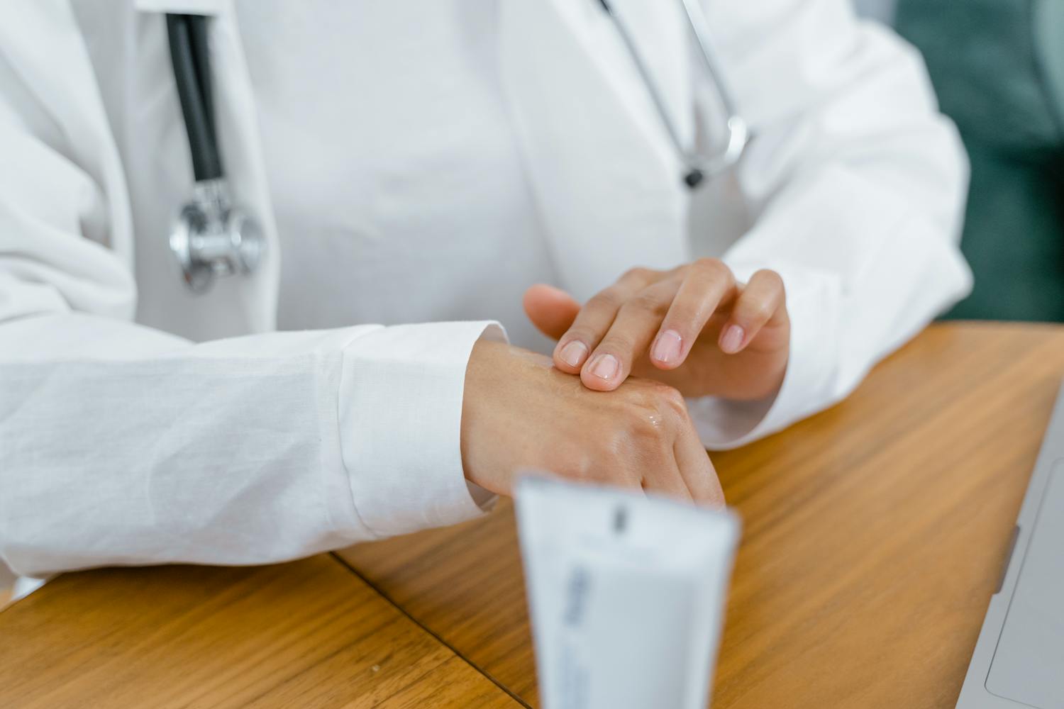 Healthcare professional applying a topical support cream