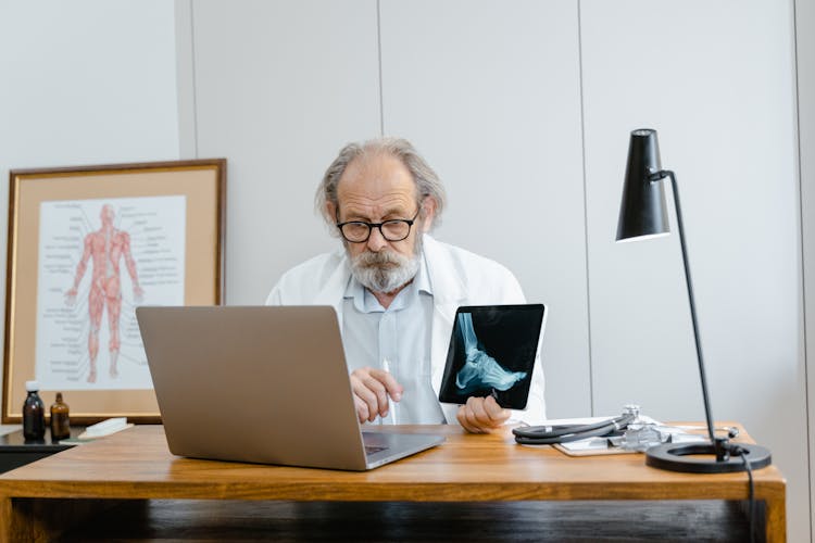 Portrait Of Doctor In Office