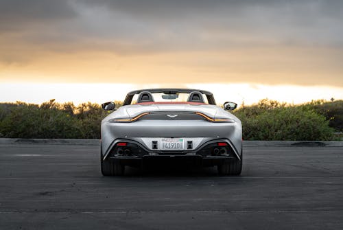 Free Gray Aston Martin on the Road during Sunset Stock Photo