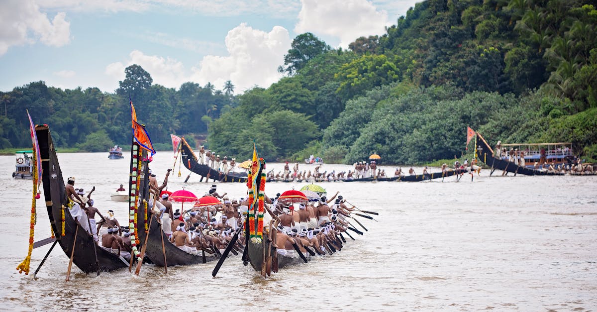 Exciting snake boat race on Pampa River in Kerala, showcasing vibrant cultural tradition.