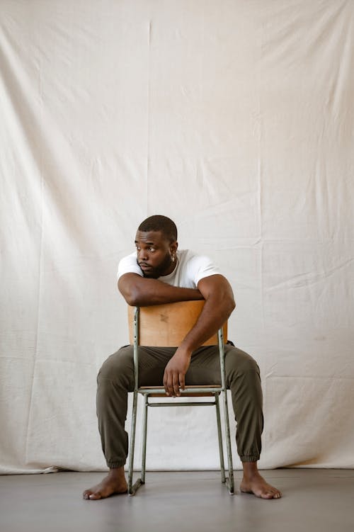 Studio Shoot of a Man Sitting on a Chair