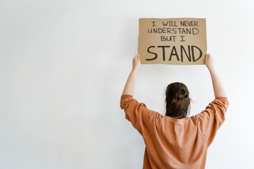 Gratis lagerfoto af aktivist, brun sweater, fredelig protest