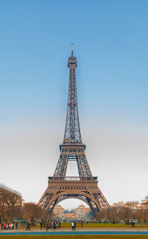 Free A Low Angle Shot of Eiffel Tower Under the Blue Sky Stock Photo
