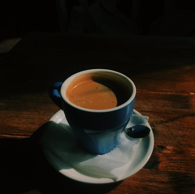 Ceramic Mug on White Ceramic Saucer