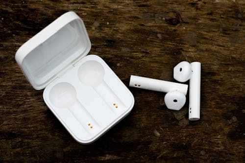 Close-Up Photo of White Earbuds